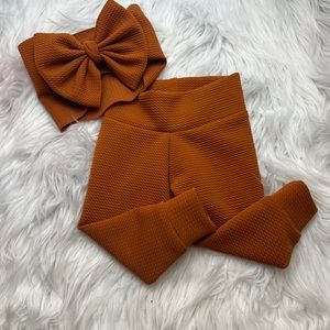 Brown pants with bow